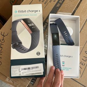 Fitbit Charge 3 - blue grey with rose gold trim.